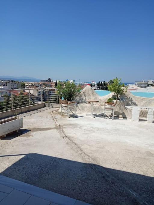Apartment Deluxe οροφοδιαμέρισμα με υδρομασάζ κ' ταρατσόκηπο Patras